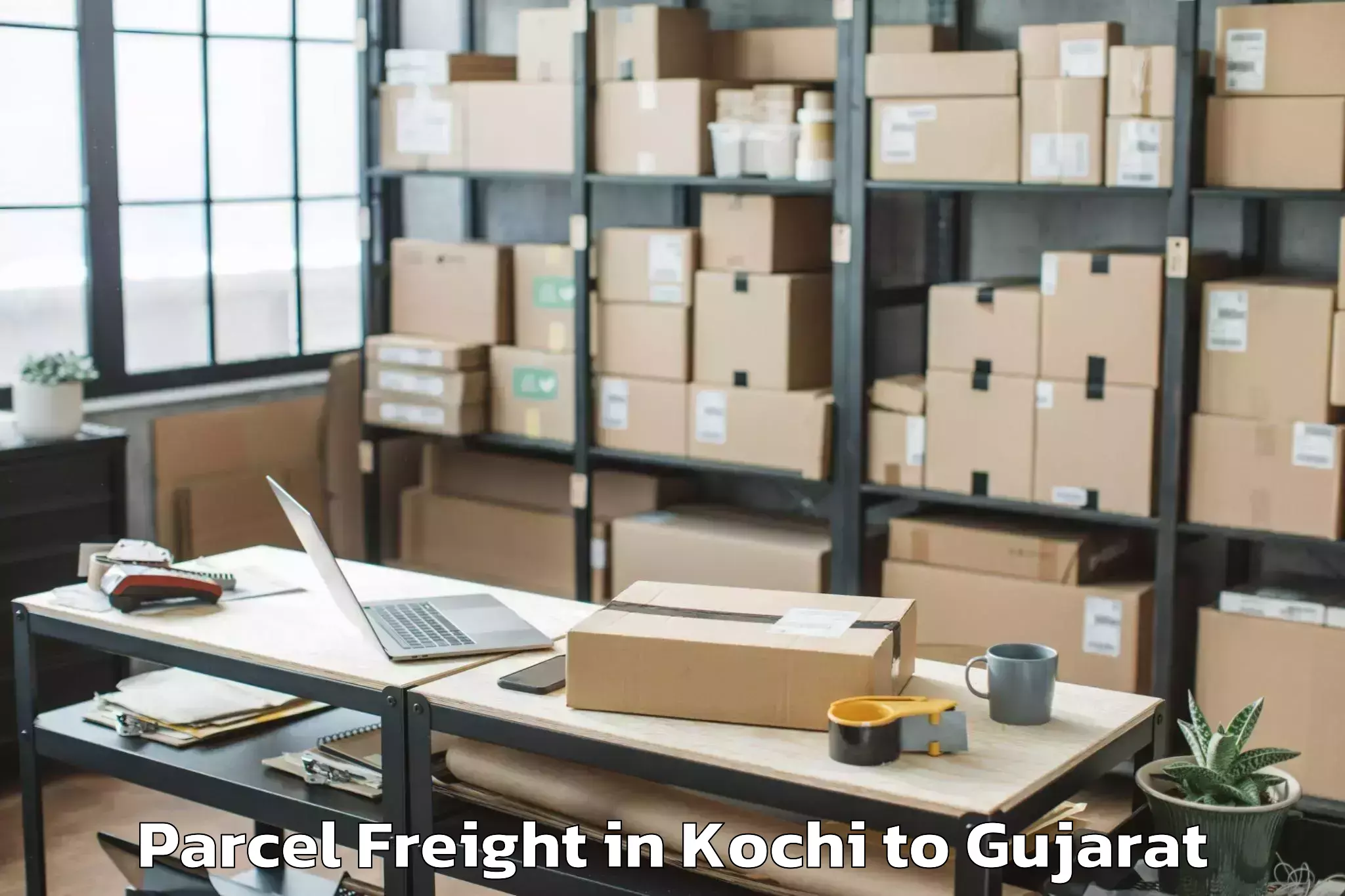 Leading Kochi to Veraval Parcel Freight Provider